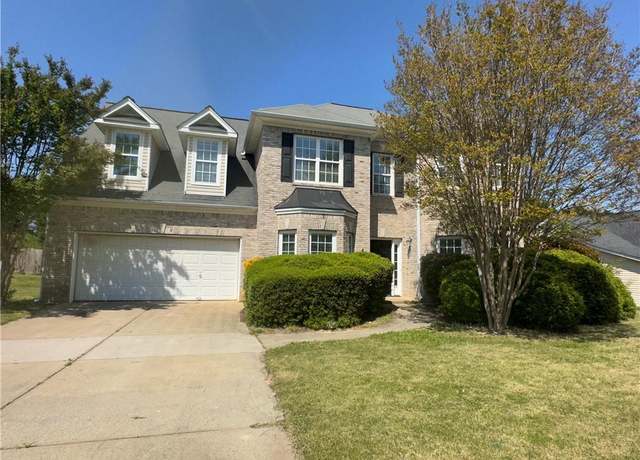 Property at 3835 Portico Run Dr, Buford, GA 30519, 5 beds, 3 baths