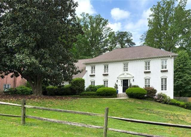 Property at 7000 Hunters Knl, Atlanta, GA 30328, 4 beds, 4 baths