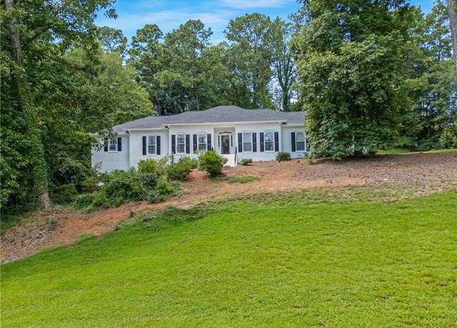 Property at 1080 Huntcliff NE, Sandy Springs, GA 30350, 6 beds, 4 baths