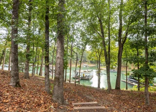 Property at 6029 Shadburn Ferry Rd, Buford, GA 30518, 6 beds, 5.5 baths