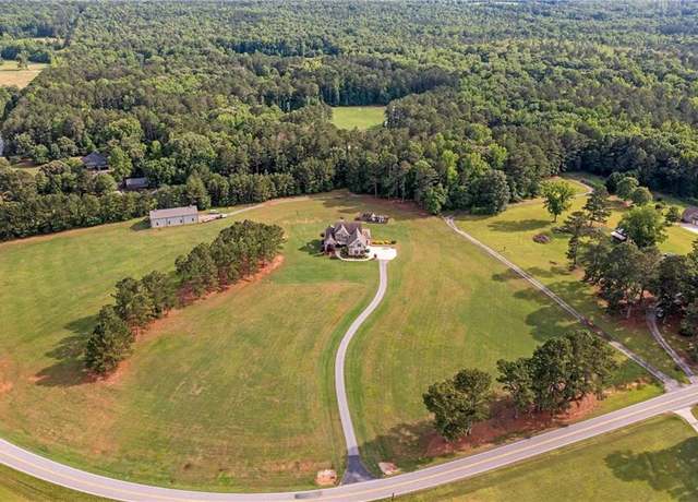 Property at 829 Christopher Rd, Sharpsburg, GA 30277, 5 beds, 5.5 baths