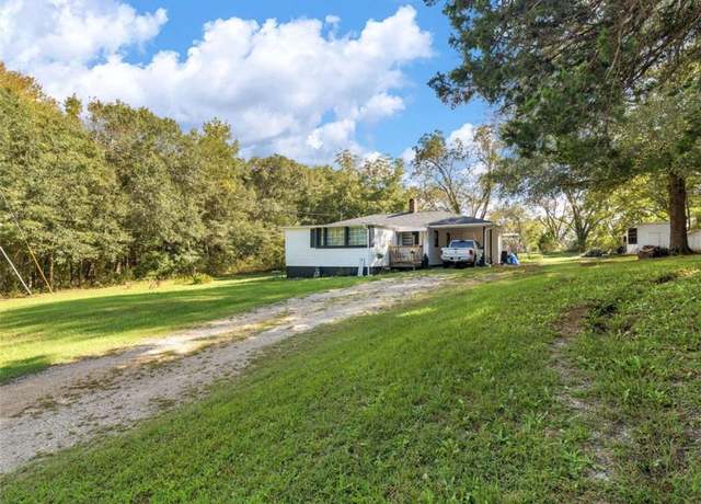 Property at 1202 Coan Dr, Locust Grove, GA 30248, 3 beds, 2 baths