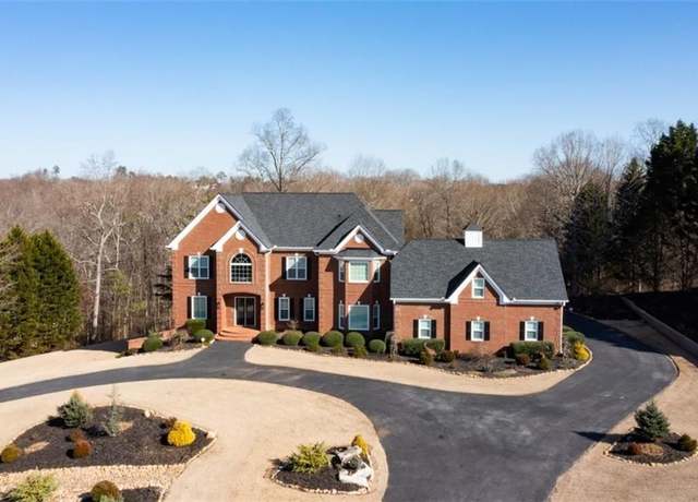 Property at 8910 Champion Ct, Ball Ground, GA 30107, 7 beds, 6.5 baths