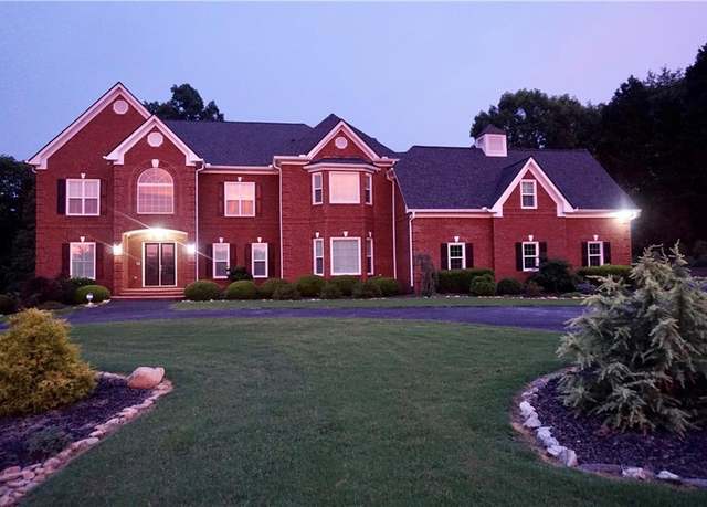 Property at 8910 Champion Ct, Ball Ground, GA 30107, 7 beds, 6.5 baths