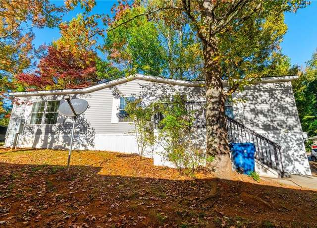 Property at 7024 Evergreen Way, Buford, GA 30518, 3 beds, 2 baths