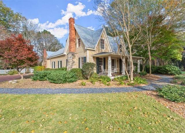 Property at 7865 Nesbit Ferry Rd, Sandy Springs, GA 30350, 6 beds, 5 baths