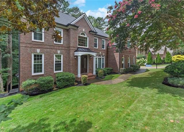 Property at 5035 Towne Lake Hls N, Woodstock, GA 30189, 5 beds, 5 baths