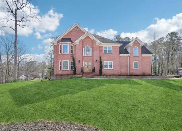Property at 1600 Spring Arbor Ct SW, Lilburn, GA 30047, 5 beds, 3 baths