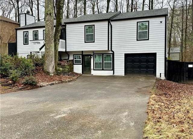 Property at 7035 Stone Wood Dr NW, Kennesaw, GA 30152, 5 beds, 3 baths