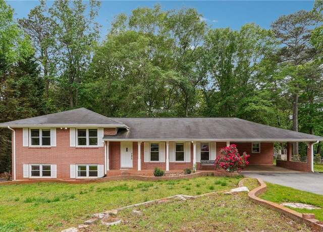 Property at 851 Rockbridge Rd SW, Lilburn, GA 30047, 4 beds, 3 baths