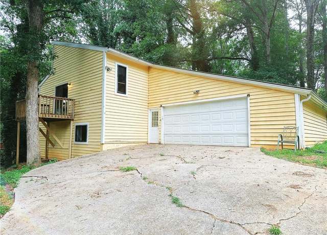 Property at 1722 Fox Holw SW, Lilburn, GA 30047, 3 beds, 2 baths