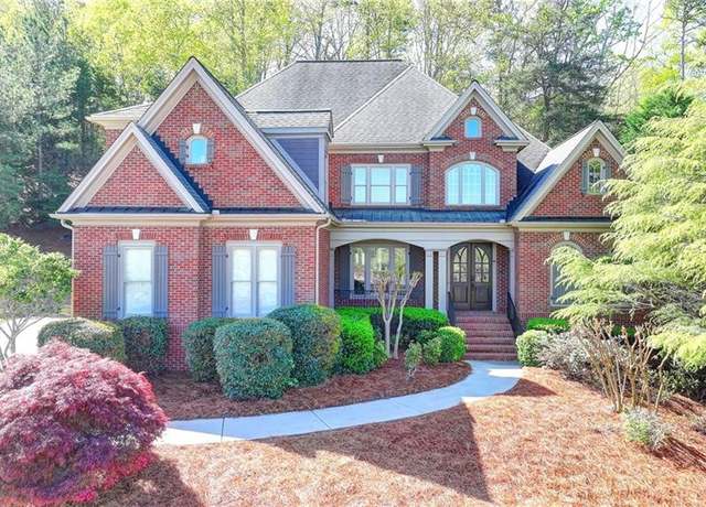 Property at 10125 Brixton Pl, Suwanee, GA 30024, 5 beds, 5.5 baths