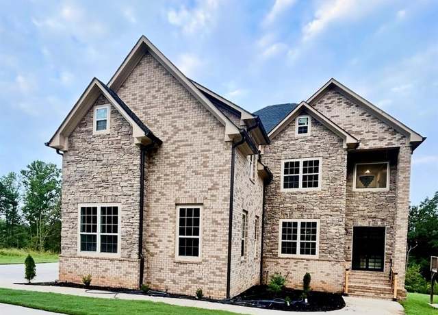 Property at 5618 Livesage Dr, Atlanta, GA 30349, 5 beds, 5.5 baths