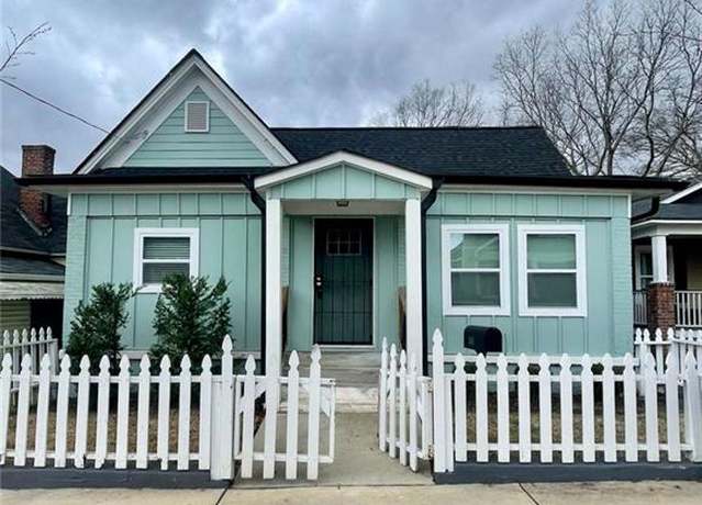 Property at 480 James P Brawley Dr NW, Atlanta, GA 30318, 5 beds, 3 baths