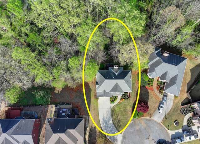 Property at 5717 Harmony Point Dr, Lilburn, GA 30047, 5 beds, 4 baths