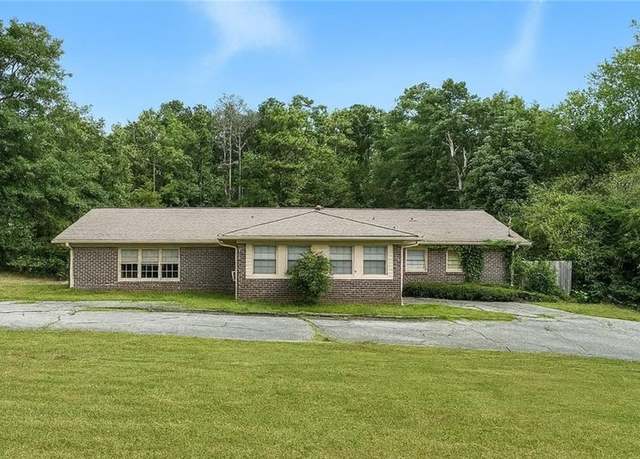 Property at 7410 Union Grove Rd, Lithonia, GA 30058, 4 beds, 3 baths