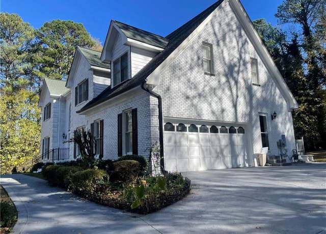 Property at 4748 Arcado Rd SW, Lilburn, GA 30047, 6 beds, 4 baths
