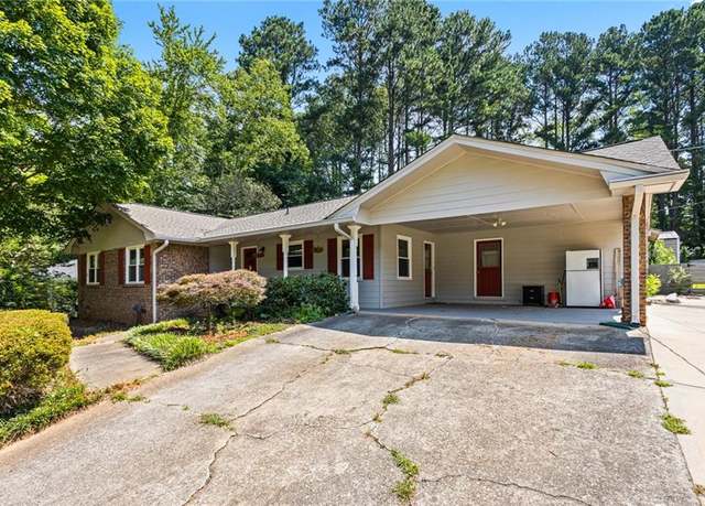 Property at 824 Hickory Ridge Rd SW, Lilburn, GA 30047, 3 beds, 2 baths
