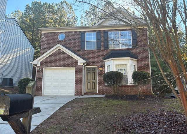 Property at 7069 Ravenwood Ln, Lithonia, GA 30038, 3 beds, 2 baths