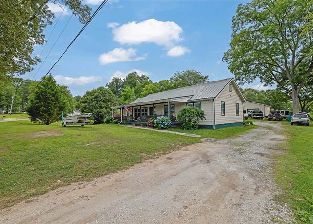 Property at 630 Cartersville St, Ball Ground, GA 30107, 4 beds, 2 baths