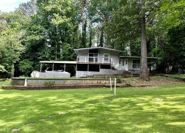 Property at 4882 Rock Haven Dr SW, Lilburn, GA 30047, 5 beds, 3 baths
