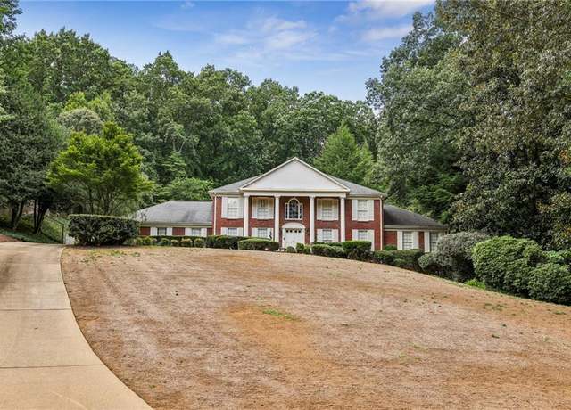 Property at 6130 Riverwood Dr, Atlanta, GA 30328, 6 beds, 4.5 baths
