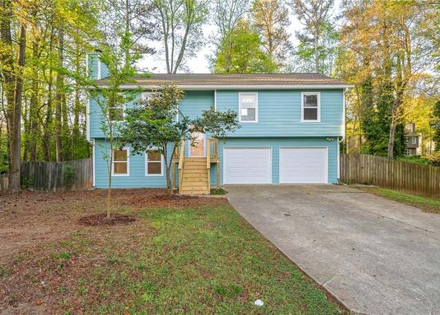 Property at 5030 Sumit Wood Dr, Kennesaw, GA 30152, 4 beds, 2 baths