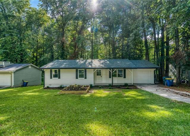 Property at 4070 Woodland Dr NW, Kennesaw, GA 30152, 3 beds, 2 baths