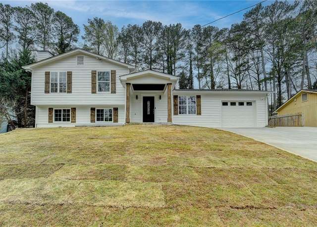 Property at 5155 Rosestone Dr NW, Lilburn, GA 30047, 5 beds, 3 baths