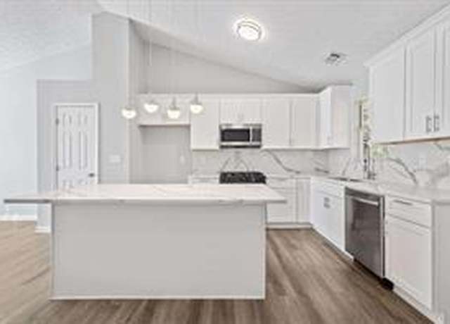 Property at 5950 Milligan Ct, Atlanta, GA 30349, 4 beds, 3 baths