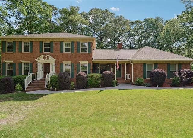 Property at 5027 Castlewood Dr SW, Lilburn, GA 30047, 4 beds, 4 baths