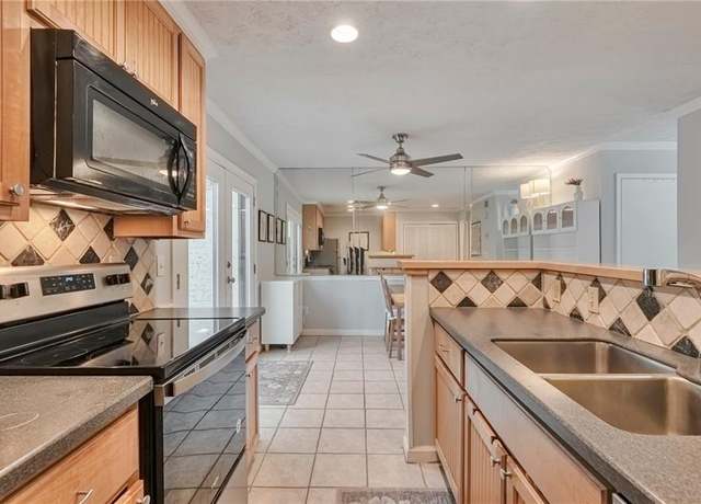 Property at 8 Arpege Way NW, Atlanta, GA 30327, 2 beds, 2.5 baths
