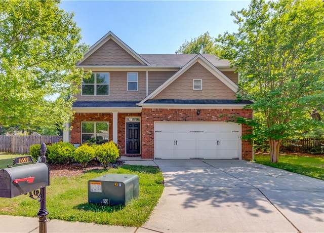 Property at 1691 Scenic Pines Dr, Lawrenceville, GA 30044, 5 beds, 3 baths