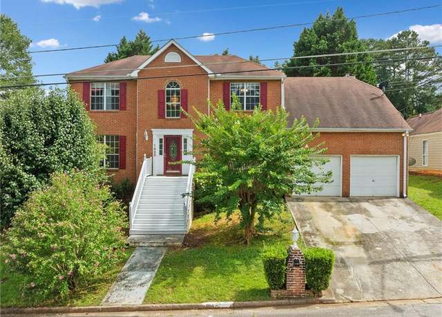 Property at 1030 Carriage Trace Cir, Stone Mountain, GA 30087, 5 beds, 3 baths