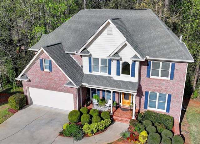 Property at 5717 Harmony Point Dr, Lilburn, GA 30047, 5 beds, 4 baths