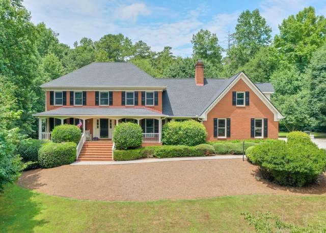 Property at 2701 Gardenwood Ct SW, Lilburn, GA 30047, 7 beds, 4 baths