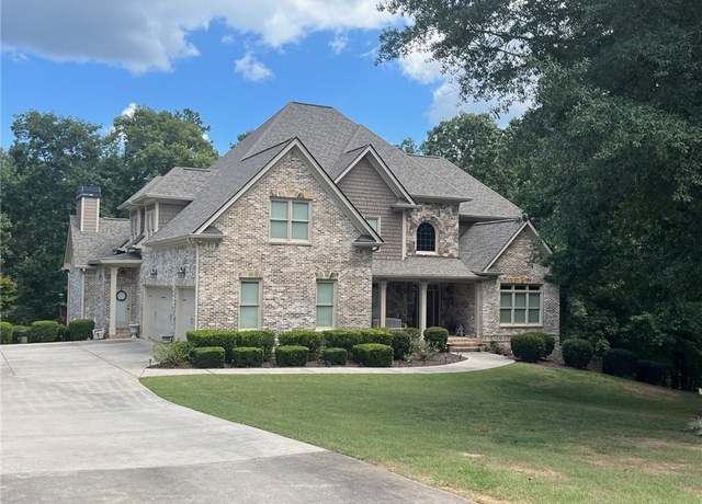 Property at 8440 Woodland Brooke Trl, Cumming, GA 30028, 5 beds, 4.5 baths
