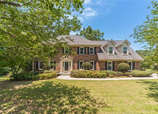 Property at 4989 Woodfall Dr SW, Lilburn, GA 30047, 5 beds, 3.5 baths