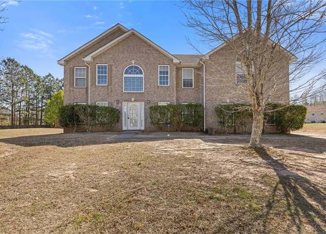 Property at 7151 Firethorn Ln, Atlanta, GA 30349, 4 beds, 2.5 baths