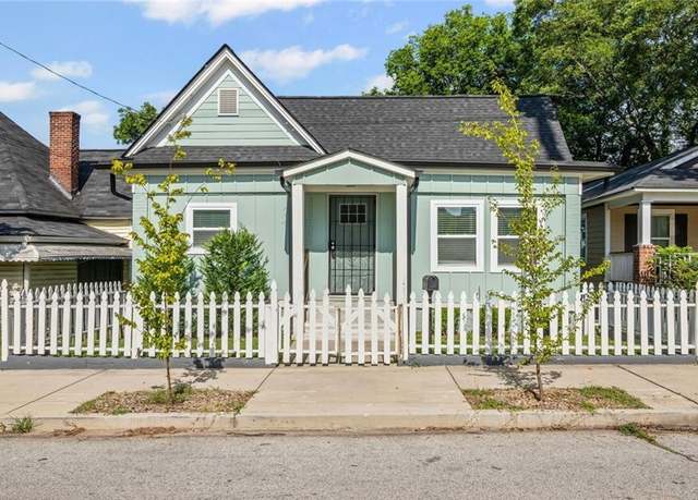 Property at 480 James P Brawley Dr NW, Atlanta, GA 30318, 5 beds, 3 baths