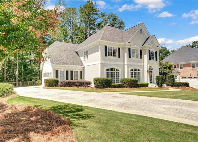 Property at 10715 Centennial Dr, Alpharetta, GA 30022, 5 beds, 4 baths