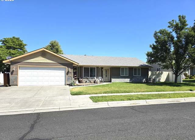 Property at 1055 NE Madrona Dr, Hermiston, OR 97838, 3 beds, 2 baths