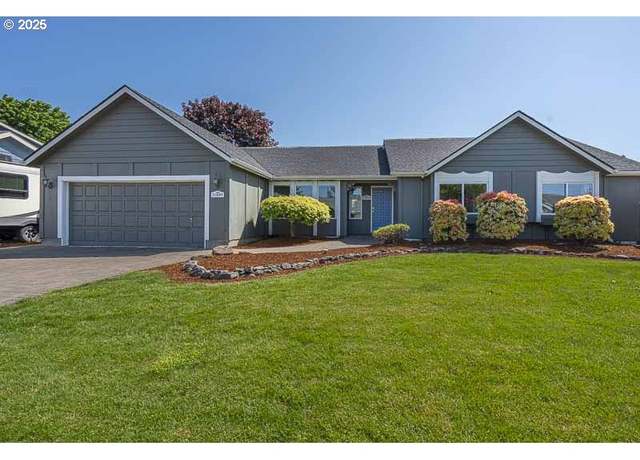 Property at 1009 SE Academy St, Dallas, OR 97338, 3 beds, 3 baths