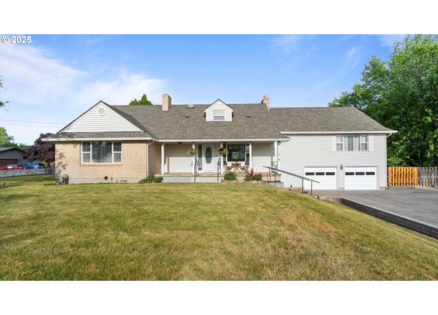 Property at 1060 SW 7th St, Hermiston, OR 97838, 4 beds, 3.5 baths
