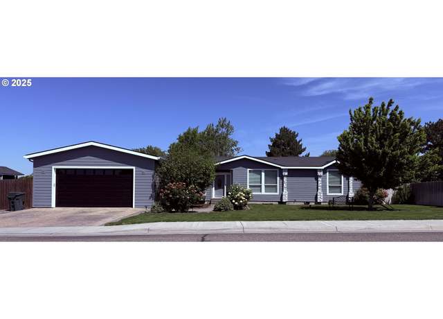 Property at 825 E Evelyn St, Hermiston, OR 97838, 4 beds, 3 baths