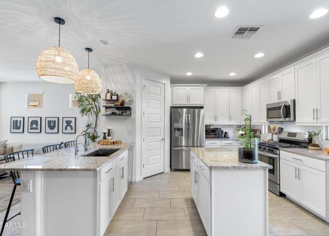 Property at 6338 W Raymond St, Phoenix, AZ 85043, 4 beds, 3 baths