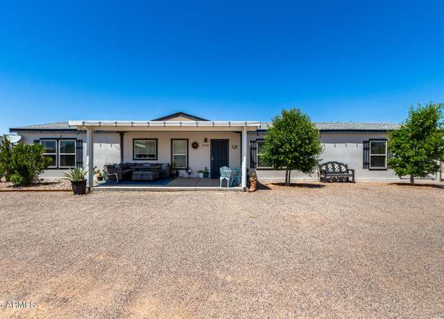 Property at 10558 N Bluegrass St N, Florence, AZ 85132, 4 beds, 2 baths