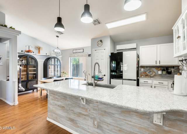 Property at 11822 W Softwind Dr, Sun City, AZ 85373, 4 beds, 2 baths