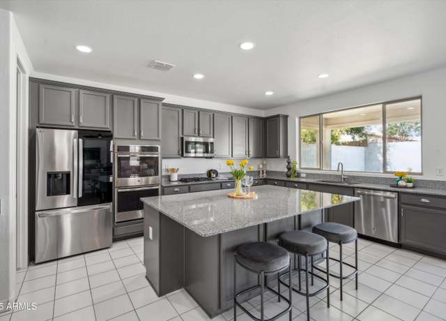 Property at 22341 N 100th Ln, Peoria, AZ 85383, 5 beds, 4 baths