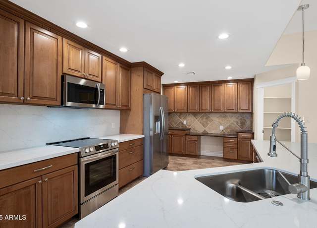 Property at 3747 E Harmony Ave, Mesa, AZ 85206, 4 beds, 2 baths